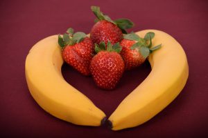 Fresh strawberries and bananas make healthy drink.